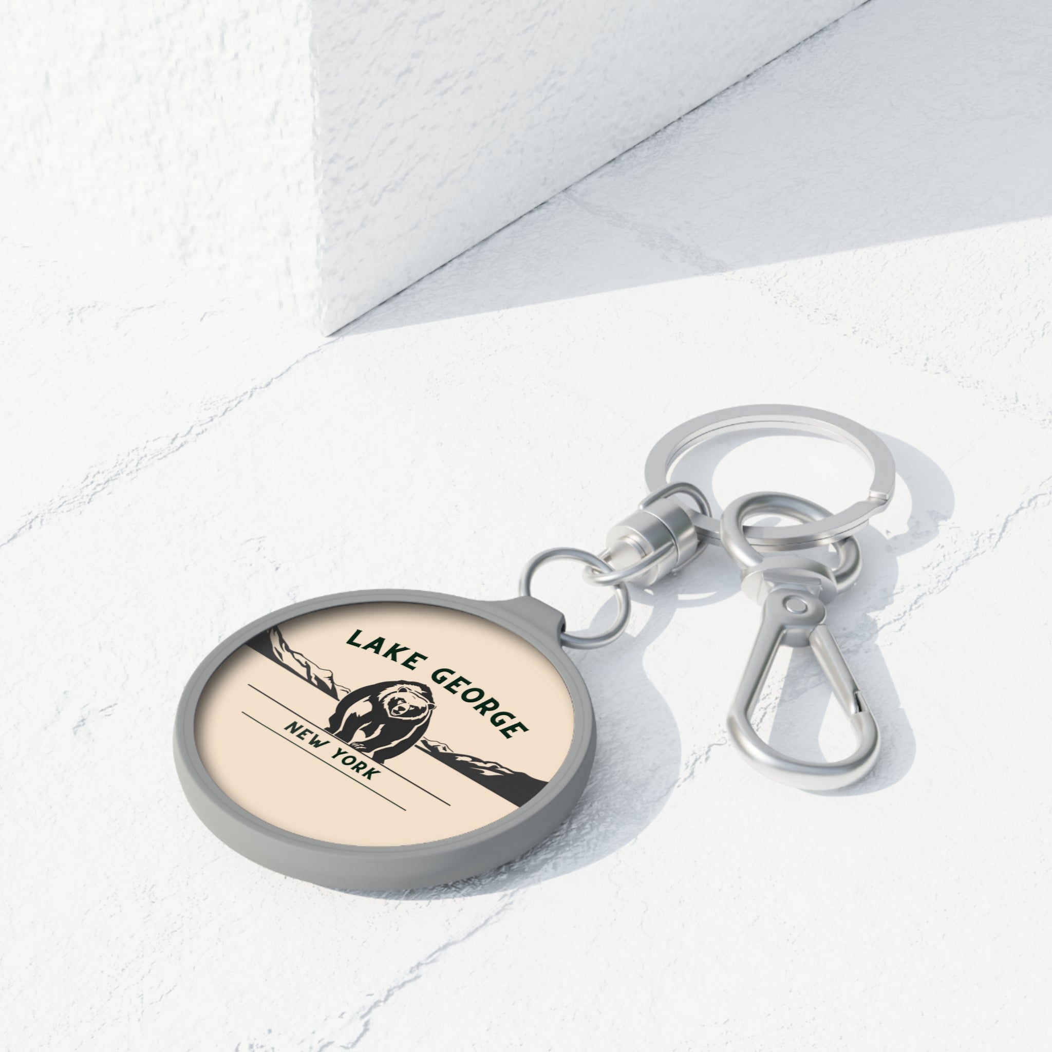 Keychain with 'Lake George, New York' text on a light background