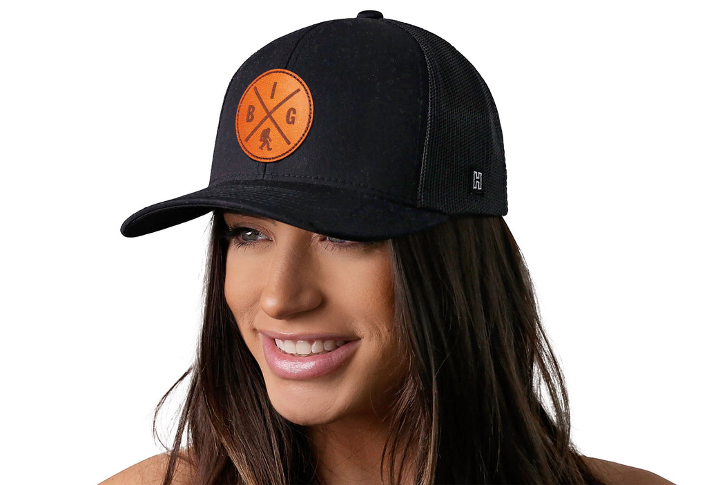 Bigfoot X Trucker Hat — Sasquatch Leather Patch Snapback, Black