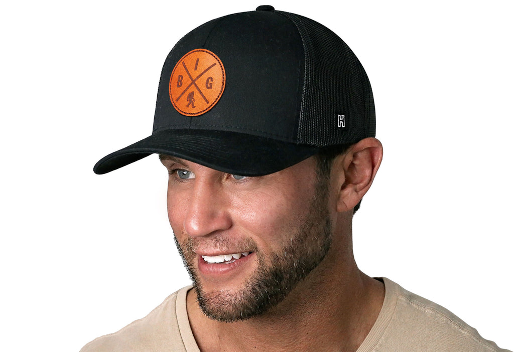 Bigfoot X Trucker Hat — Sasquatch Leather Patch Snapback, Black