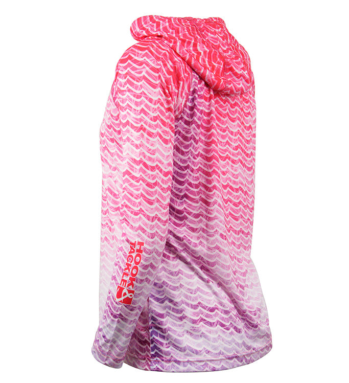 Pink and purple patterned poncho with a brand logo on a white background