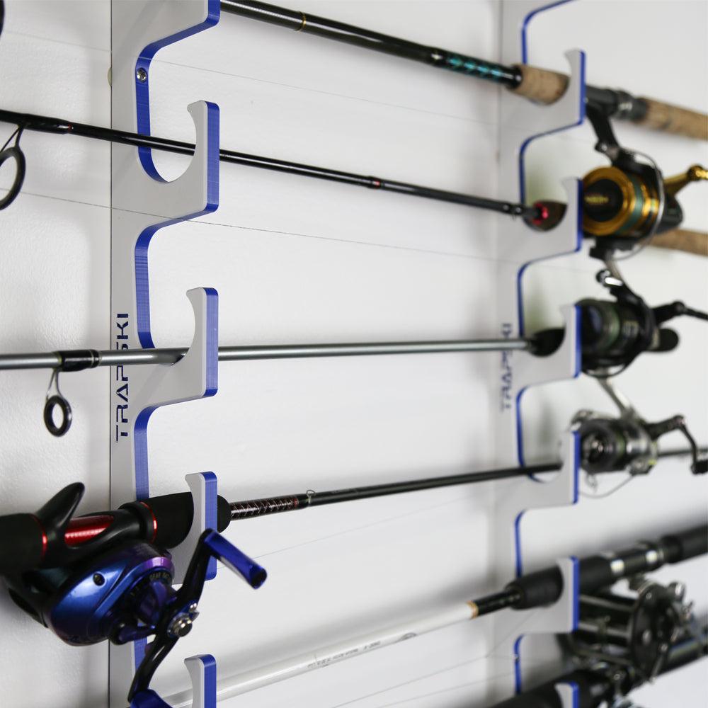 Fishing rod holder with multiple fishing rods and reels on a white background