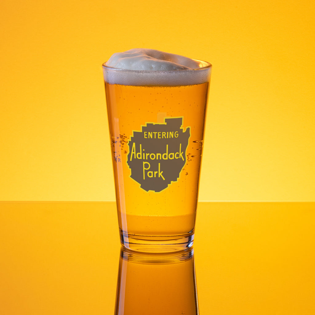 Entering Adirondack Park vintage sign design pint glass gold background